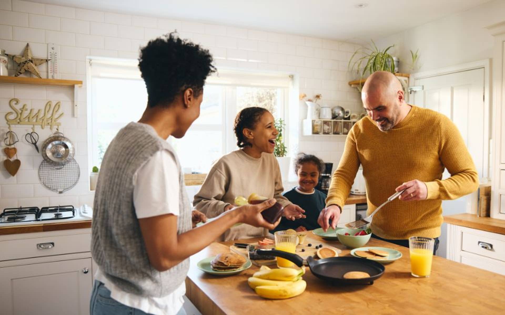 Family morning routine making breakfast together